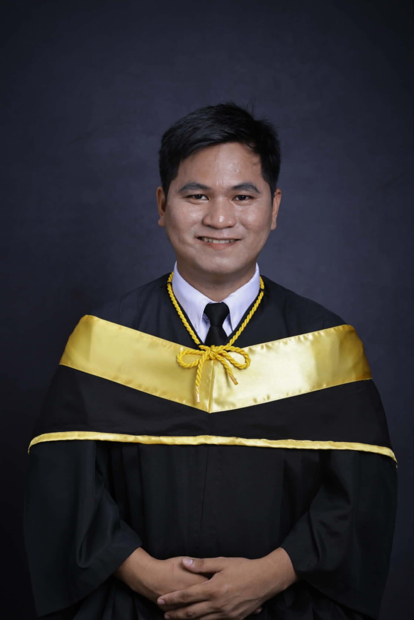 Julieto Nangkil in graduation attire