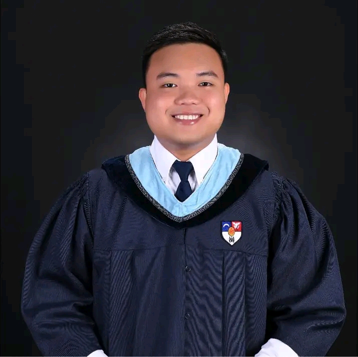 Mar Lawrence F. Calinawan in graduation attire