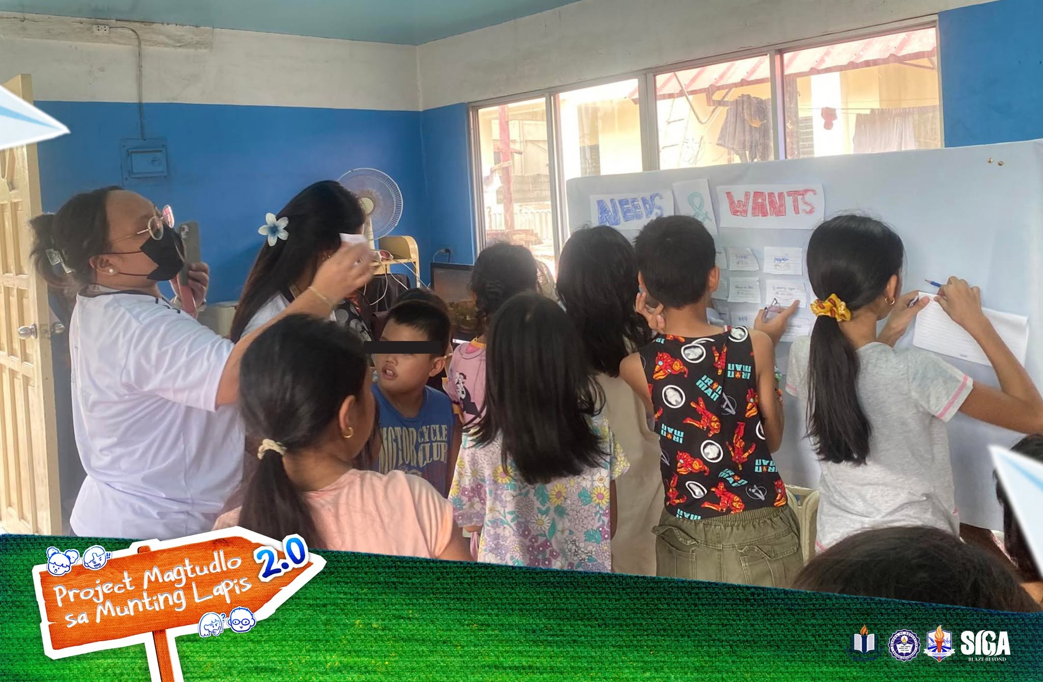Children look at a classroom display with student volunteers