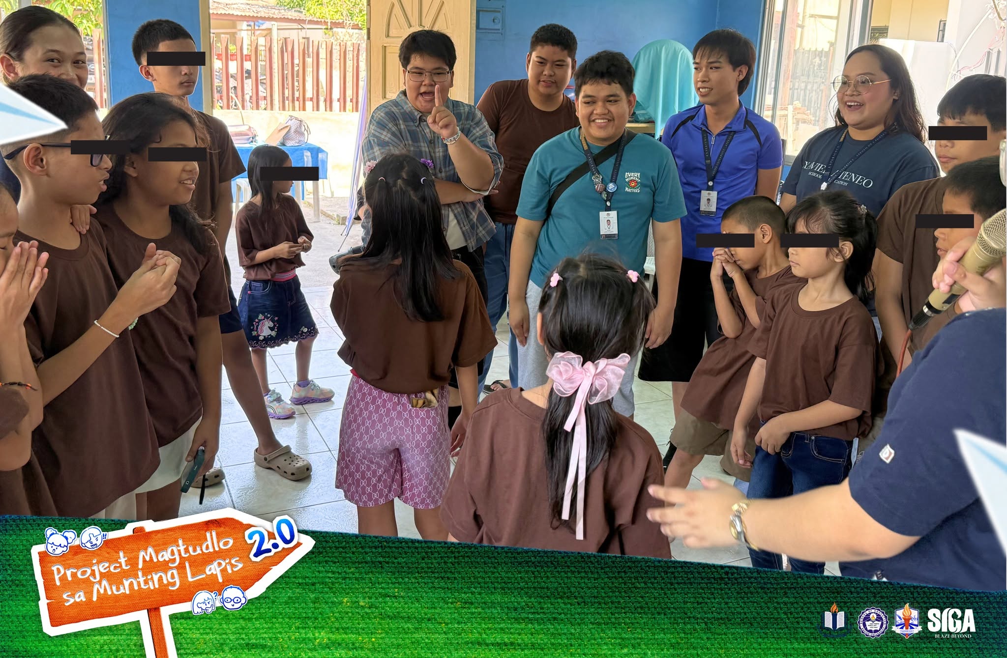 Student volunteers talk with children at the center